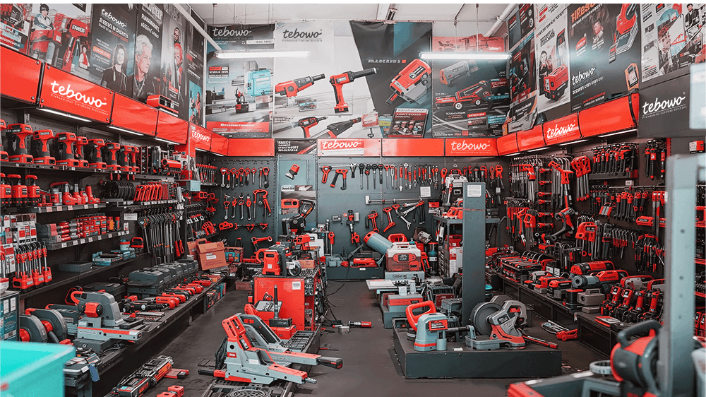 Large retail wall stocked with power tools and accessories