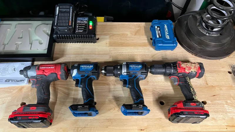 Cordless drills and impact drivers displayed together