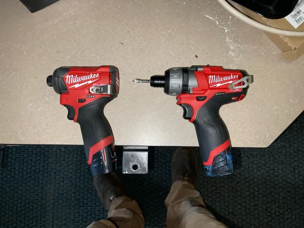 Compact and larger impact driver bodies shown side by side