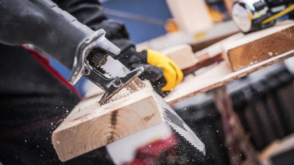 Reciprocating saw making a rough cut in timber