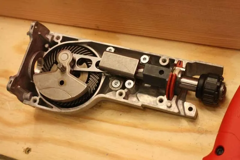 Exposed reciprocating saw mechanism shown for identification, not repair instruction